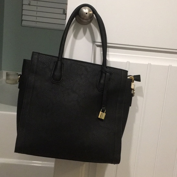 Charming Charlie Handbags - Like New Black Handbag from Charming Charlie